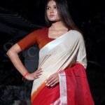 cream red saree